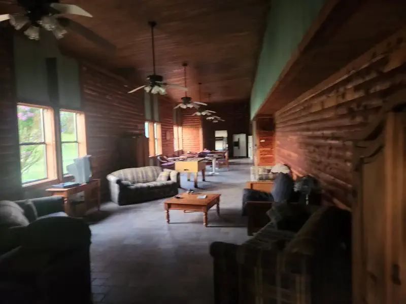Spacious hunting lodge at Sanctuary Ranch in Arkansas with bunk-style sleeping for up to 38 guests, ideal for group hunts and retreats