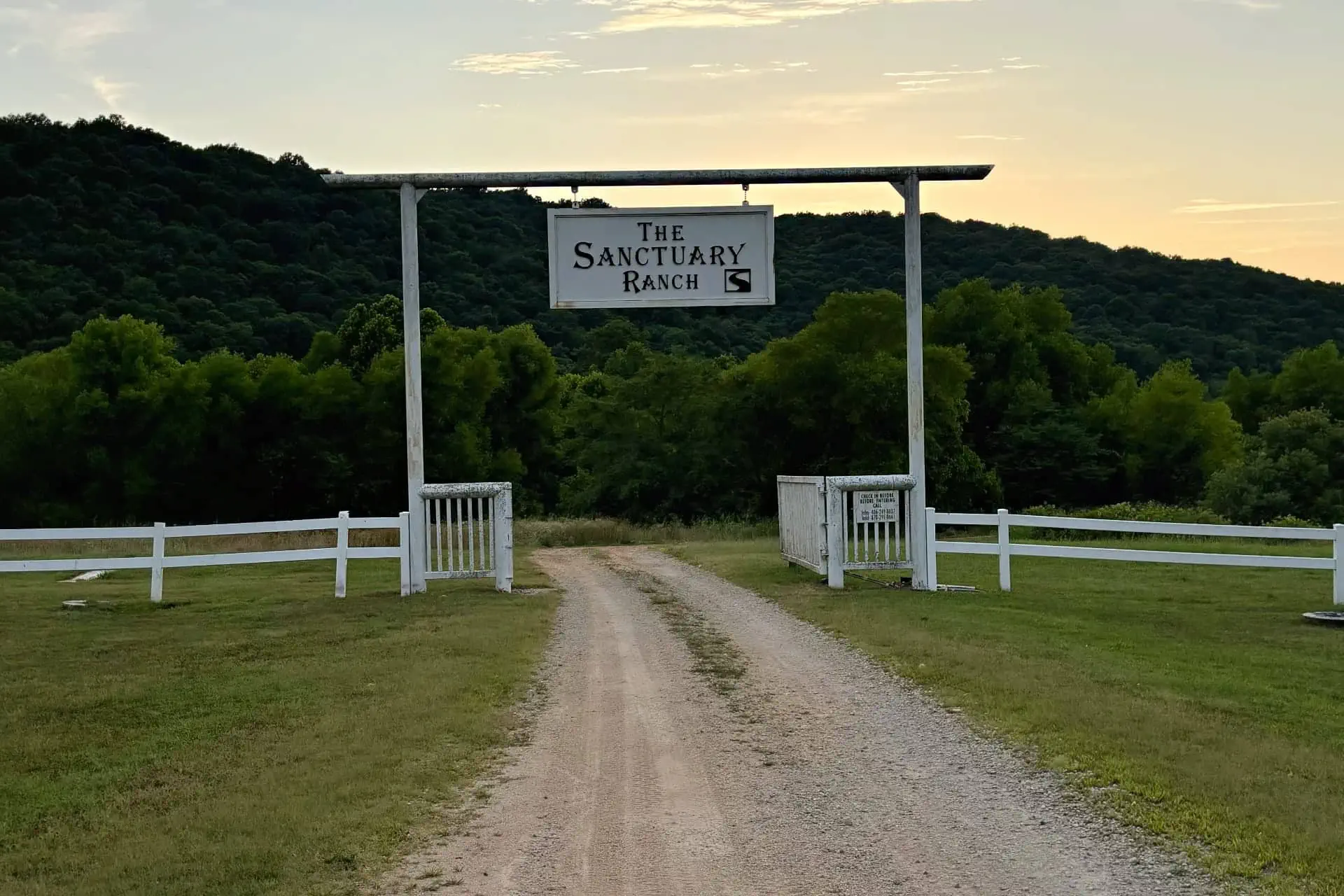 Rolling Ozark hills and hardwood forest at Sanctuary Ranch hunting lodge in Mount Pleasant, Arkansas